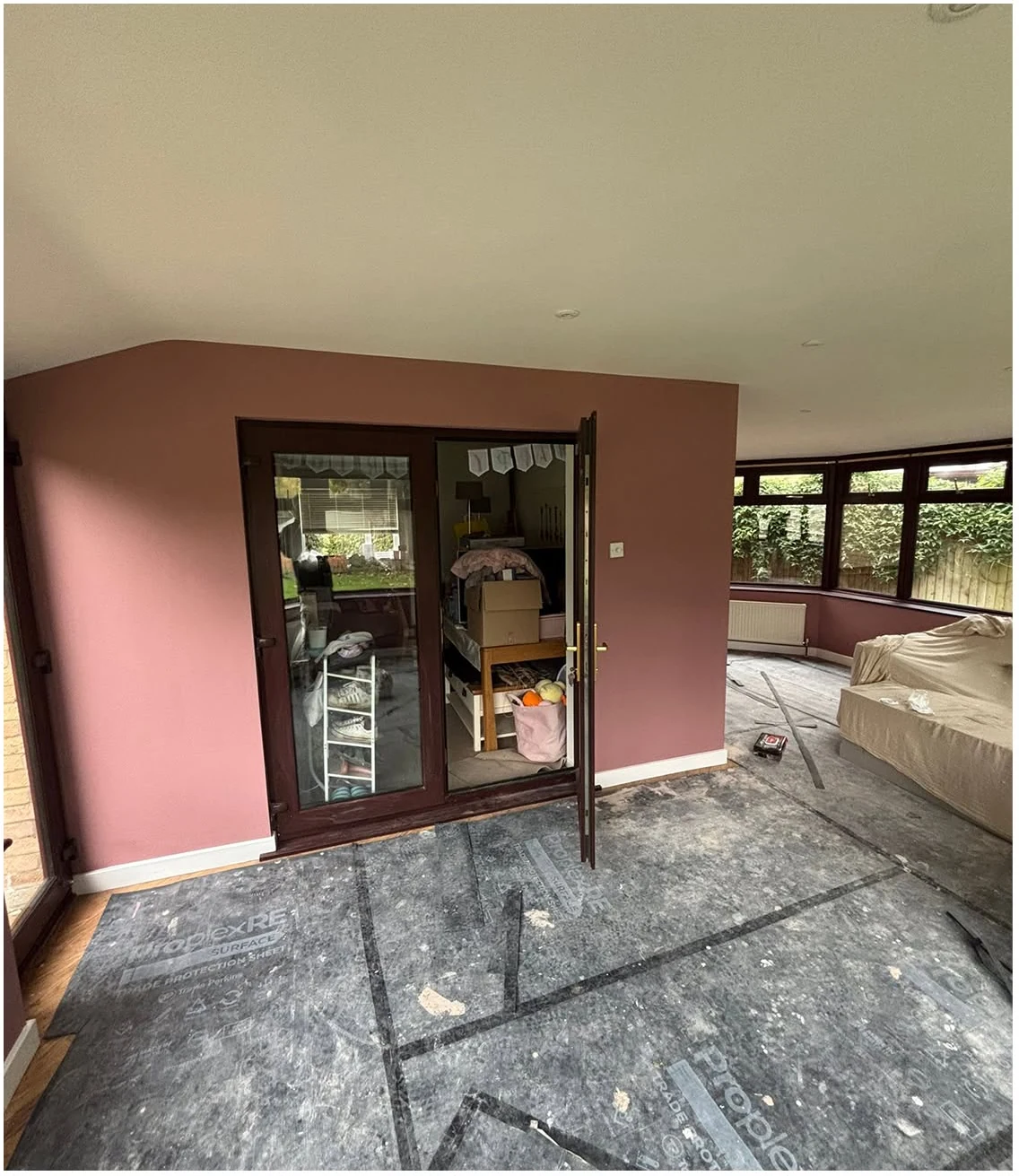 Warm painted feature room with finished walls and wood flooring in Norfolk